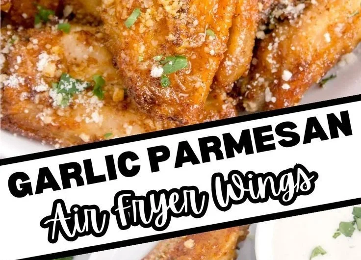 Plate of crispy air fryer garlic parmesan wings garnished with herbs