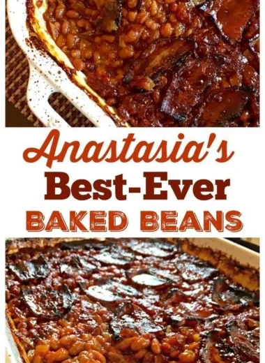 A plate of Anastasia's best-ever baked beans topped with herbs