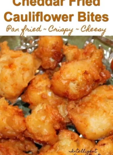 Cheddar fried cauliflower bites on a plate, golden and crispy.