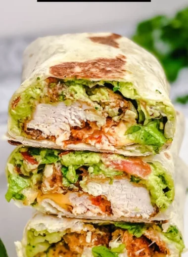 Crispy Chicken Wrap with fresh veggies and sauces served on a plate