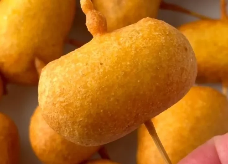 Delicious homemade mini corndogs served on a platter