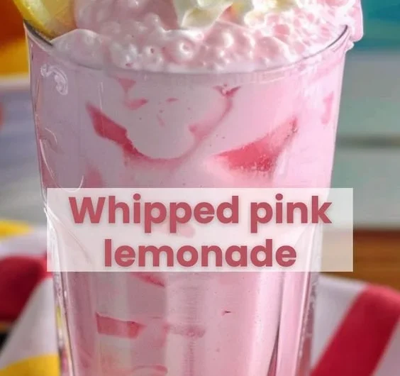 Delicious glass of strawberries and cream lemonade with fresh strawberries