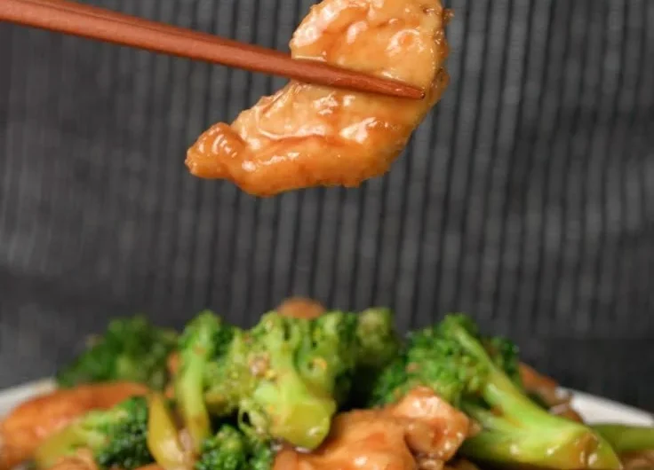 Chinese chicken and broccoli stir fry served in a bowl