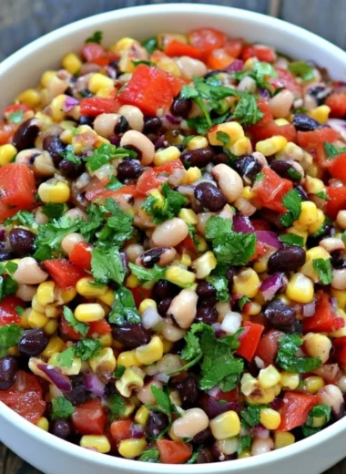 Bowl of colorful Cowboy Caviar made with fresh vegetables and beans