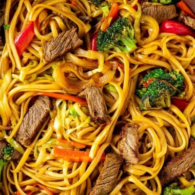 Delicious cozy beef stir fry served with linguini in a bowl