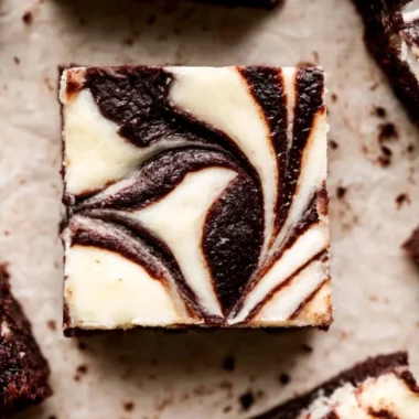 Delicious cheesecake marble brownies with swirls of cream cheese on top