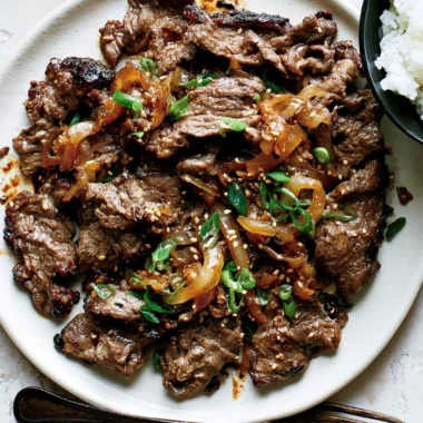 Delicious Korean beef bulgogi served on a plate with vegetables