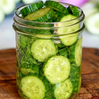 Freshly prepared cucumber snack with herbs and spices in a bowl.
