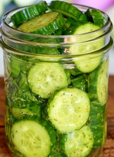 Freshly prepared cucumber snack with herbs and spices in a bowl.