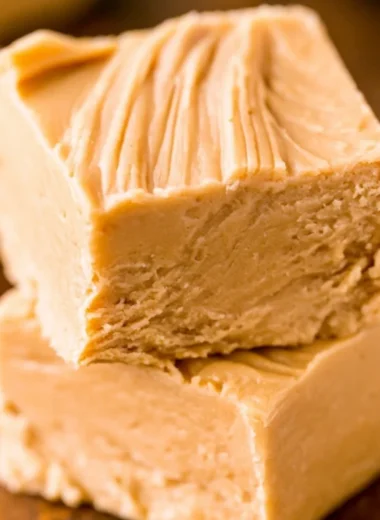Delicious easy peanut butter fudge squares on a plate