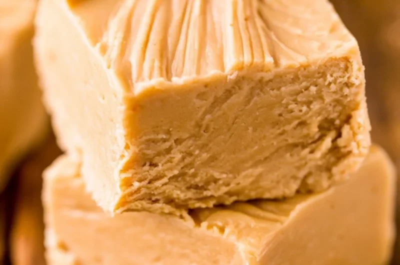 Delicious easy peanut butter fudge squares on a plate