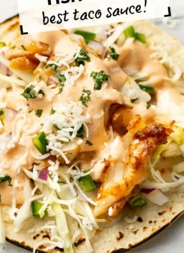 Delicious homemade fish tacos garnished with fresh herbs and lime