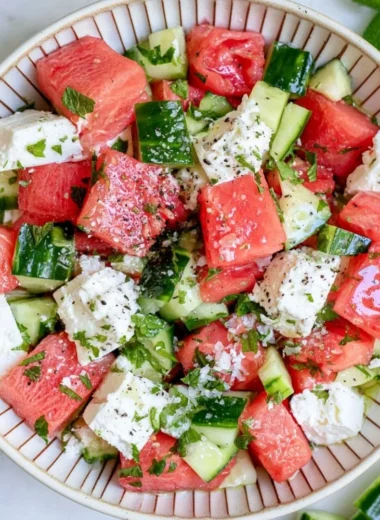 Fresh watermelon, cucumber, and feta salad in a bowl