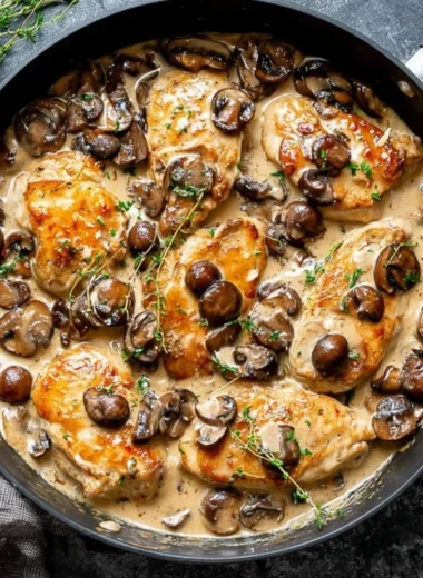 Skillet Chicken with Mushroom Wine Sauce served in a skillet