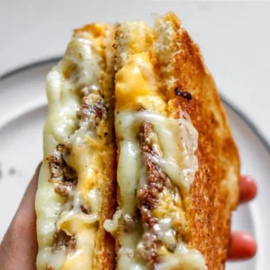 Smashburger Grilled Cheese sandwich with melted cheese and toasted bread.