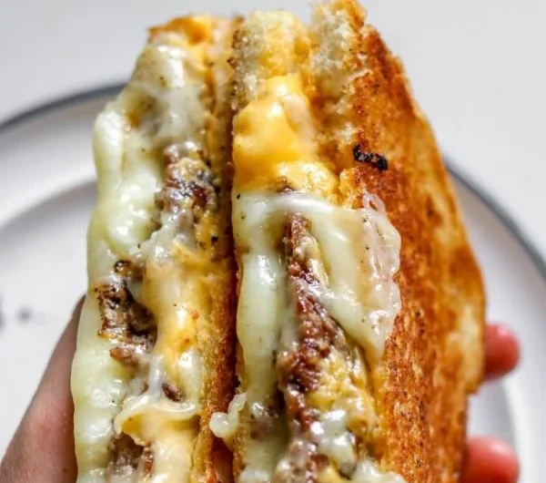 Smashburger Grilled Cheese sandwich with melted cheese and toasted bread.