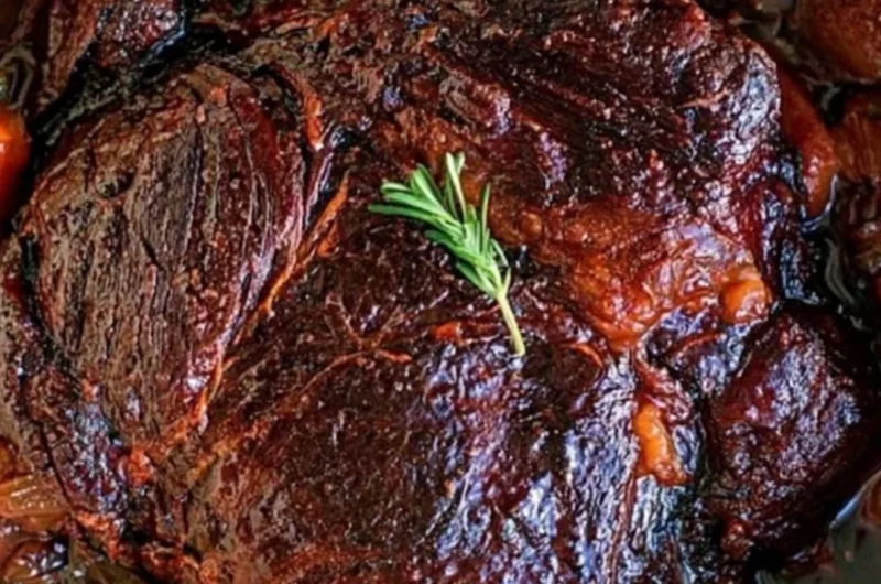 Delicious beef chuck roast cooked to perfection, served with vegetables.