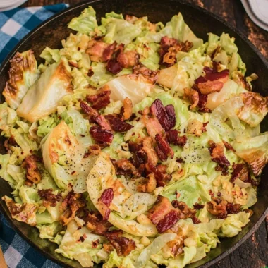 Plate of Southern Fried Cabbage with Crispy Bacon, a delicious southern side dish.