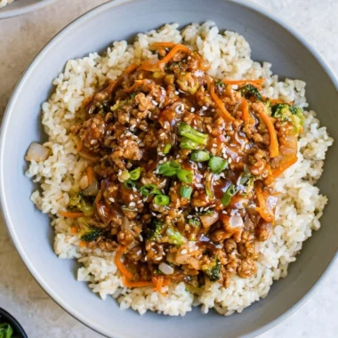 Delicious cozy teriyaki turkey rice bowl garnished with vegetables