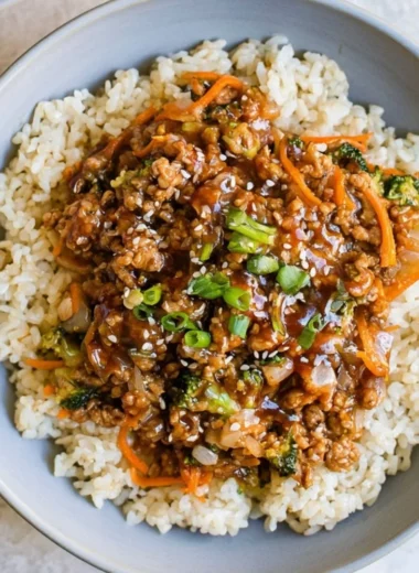Delicious cozy teriyaki turkey rice bowl garnished with vegetables