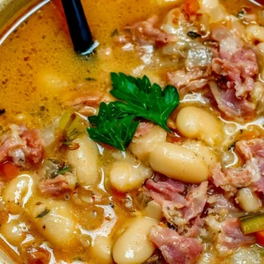 Crock Pot ham bone soup with beans in a bowl, perfect for warming up.