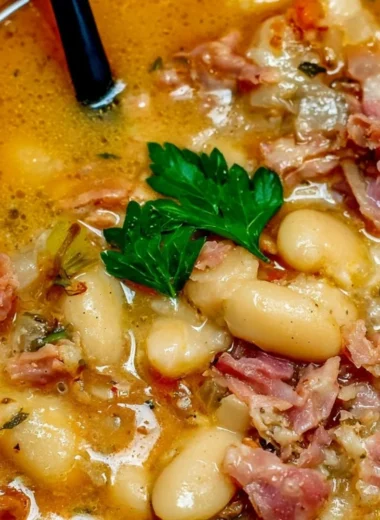 Crock Pot ham bone soup with beans in a bowl, perfect for warming up.