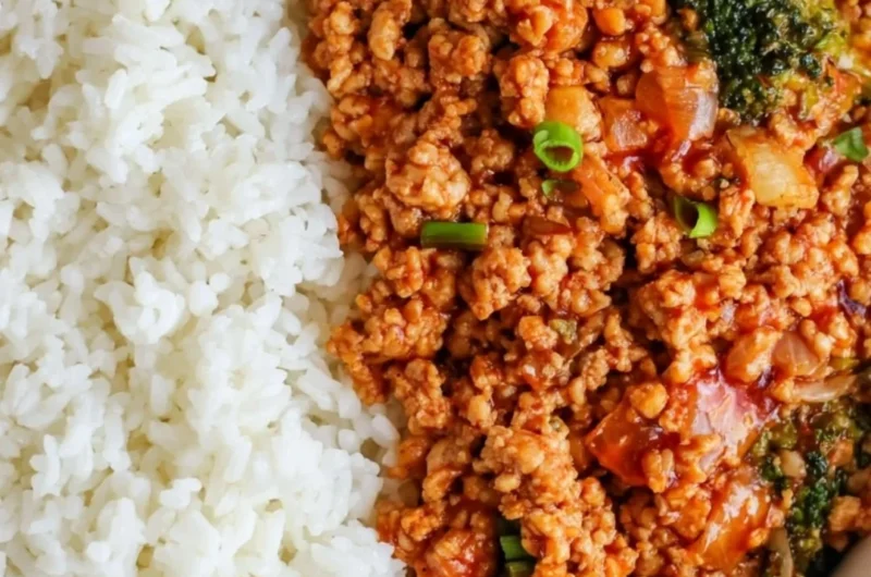 Spicy Firecracker Ground Chicken dish served in a bowl with garnishes.