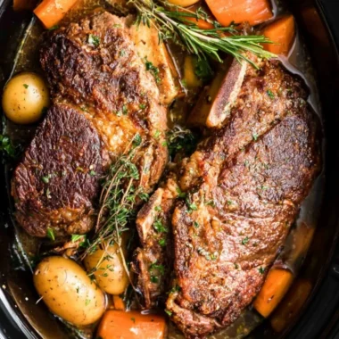Delicious slow cooker pork roast served with vegetables