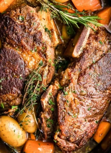 Delicious slow cooker pork roast served with vegetables