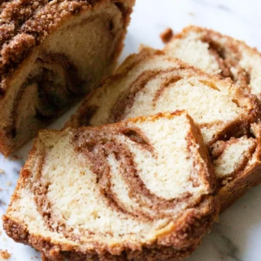 A cozy cinnamon swirl vanilla pound cake with a fluffy texture and rich flavor