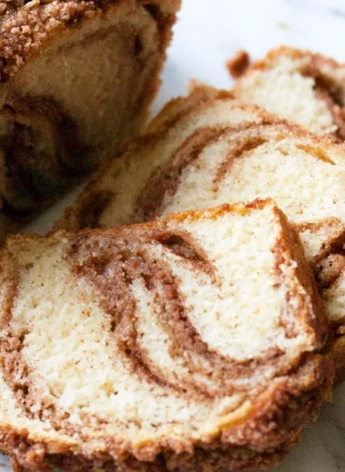 Cozy cinnamon swirl vanilla pound cake served on a plate