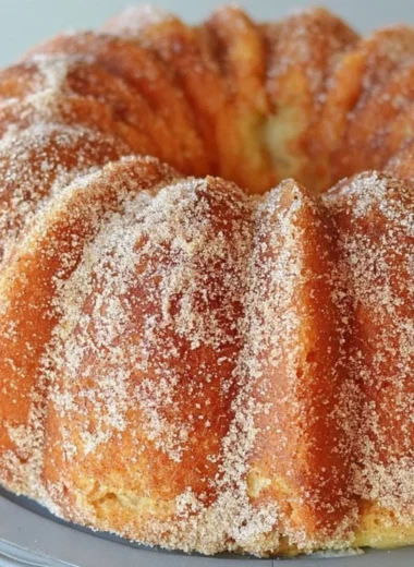 Delicious Apple Cider Bundt Cake drizzled with Caramel Apple Glaze