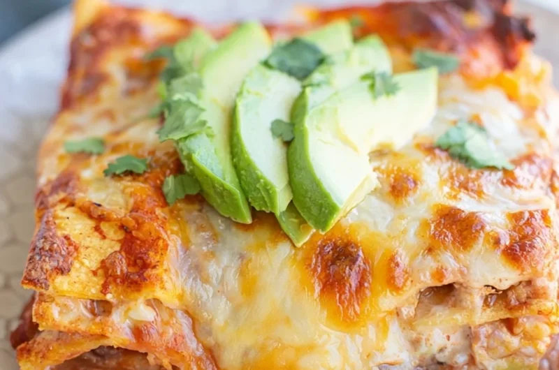 Cozy Bean and Cheese Enchilada Casserole served warm in a baking dish