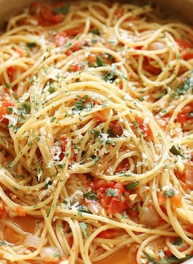 Delicious cozy one pot pasta dish served in a bowl with fresh herbs