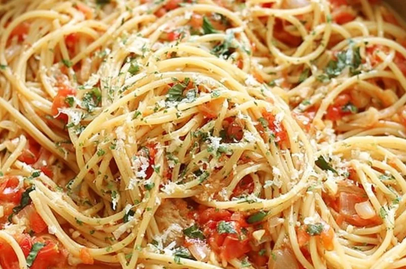 Delicious cozy one pot pasta dish served in a bowl with fresh herbs