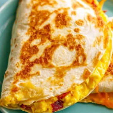 Delicious Breakfast Quesadilla filled with eggs, cheese, and vegetables