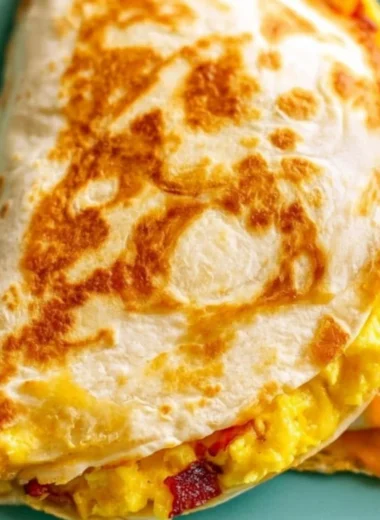 Delicious Breakfast Quesadilla filled with eggs, cheese, and vegetables