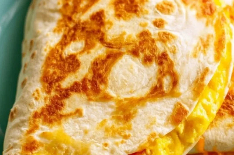 Delicious Breakfast Quesadilla filled with eggs, cheese, and vegetables