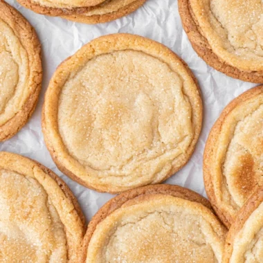 Freshly baked brown butter sugar cookies on a cooling rack