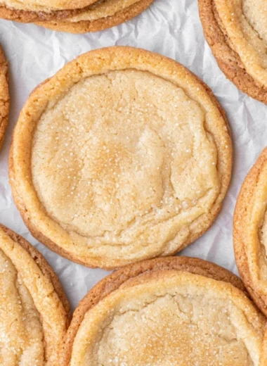 Freshly baked brown butter sugar cookies on a cooling rack