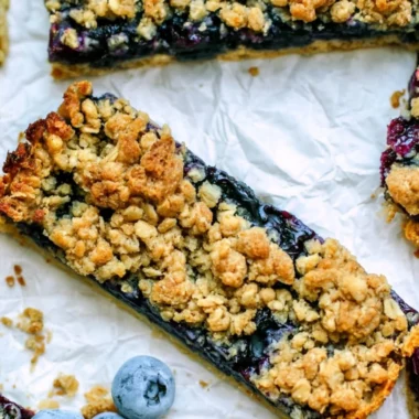 Brown Sugar Oatmeal Breakfast Bars with Blueberries on a plate