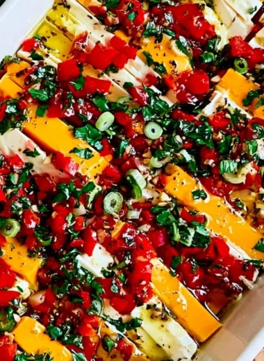 Delicious marinated cheese recipe with fresh herbs and spices.